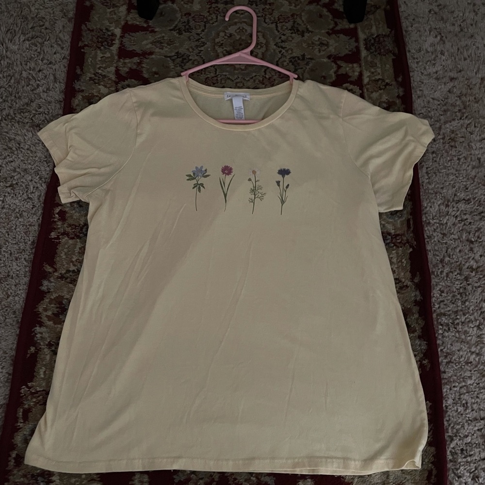 Yellow tee shirt with flowers